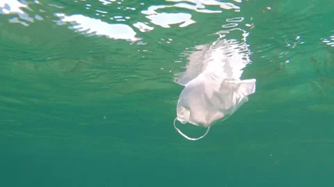 Ocean Pollution From Discarded Mask Stock Footage 137485588