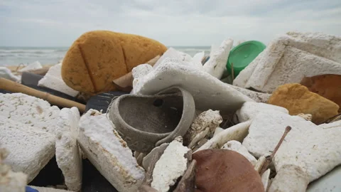 Ocean Pollution Impact: Plastic and Debris on Beach. Video stock 281816830