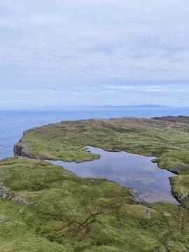 Ocean Pools Under Cloudy Sky in Fair Head, Northern Ireland Stock Photos