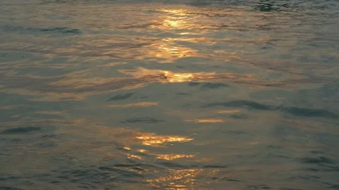 Ocean in the rays of the setting sun. Ocean shore in purple sunset. Twilight. Stock Footage 134122674