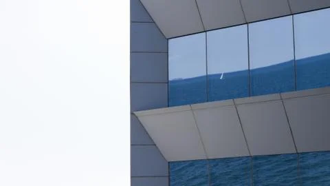 Ocean reflected in the windows. Stock Photos