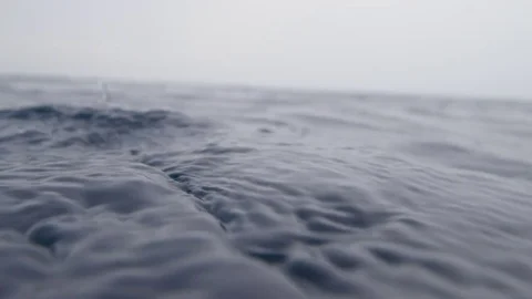 Ocean ripple with rain drops Stock Footage 79058880