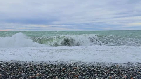 The ocean is rough and the waves are crashing against the shore Stock Footage 278146589