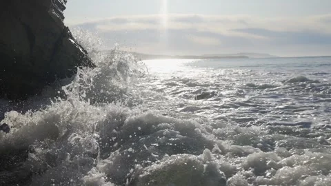 The ocean is rough and the waves are crashing against the rocks Stock Footage 298270712