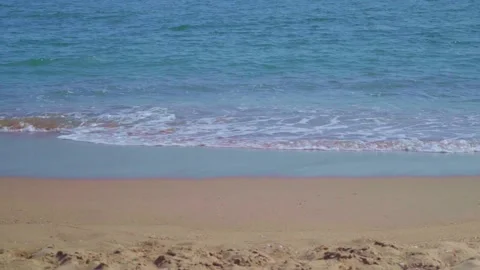 Ocean sandy beach and blue water, Waves hit the beautiful sandy beach Stock Footage 260287223