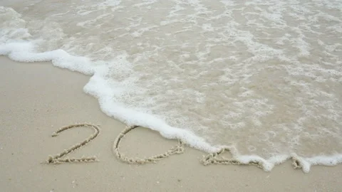 Ocean sea wave splash change year  2021 to 2022 on sandy beach Stock Footage 166557161