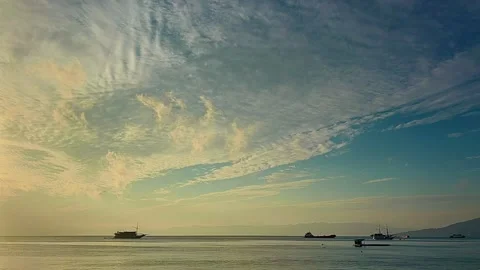 Ocean Seascape with Moving Clouds and Boats at Sunrise Timelapse Stock Footage 342310766