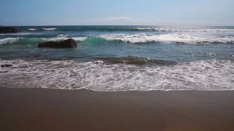 Ocean seascape with waves crashing on sandy shore. Stock Footage 82806437