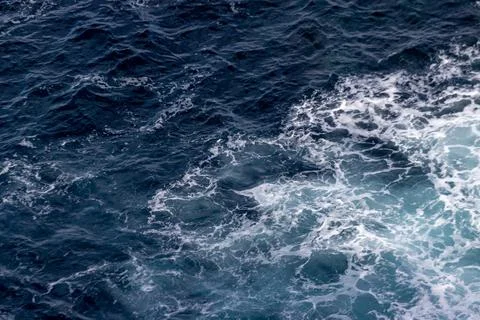 Ocean seen from above, close, waves, pattern strong and powerful. Stock Photos