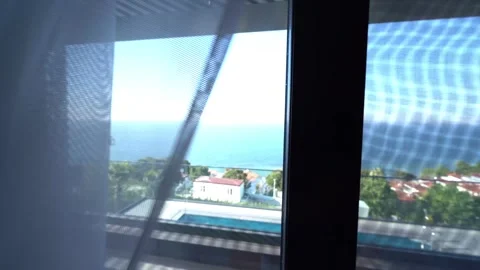 Ocean Serenity: View Through a Poolside Window 스톡 동영상 310036667