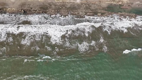 Ocean shore with waves in dusk time  Video stock 303995102