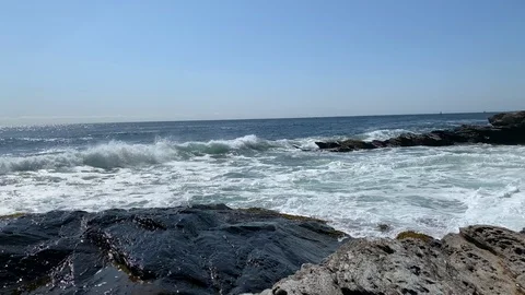 Ocean Shoreline Rock Cliffs with Waves Crashing Stock Footage 116346947