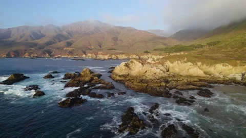 Ocean Side Cliffs and Waves Drone Footage Stock Footage 163232986