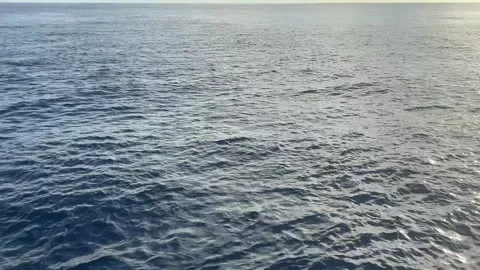 From Ocean to Sky: A Stunning View of Waves and Clouds Video stock 296600035