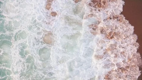 Ocean splash on a beautiful sandy beach at evening aerial view Stock Footage 80278885