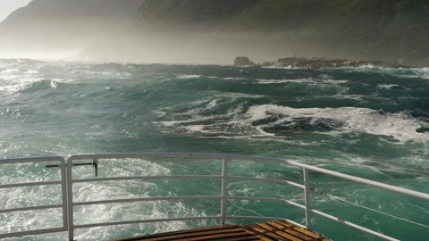 Ocean storm waves create bumpy ride for tour boat off Cape Town, RSA Stock Footage 235644950