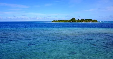 Ocean stream moving around an isolated exotic island in Linapacan, Stock Footage 118244227
