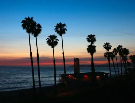 Ocean summer sunset Stock Photos