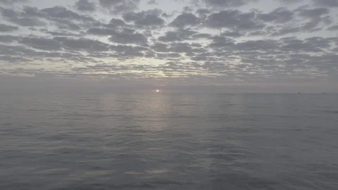 Ocean Sunrise Drone Pull D-Log Stock Footage 90017446