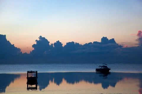Ocean sunset, boat. 스톡 사진