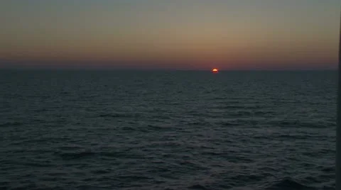 Ocean sunset disappears into the night Stock Footage 11202922