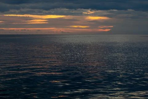 Ocean Sunset With Dramatic Clouds Stock Photos