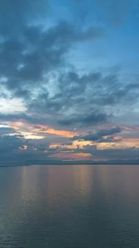 Ocean Sunset with Dramatic Clouds Stock Photos