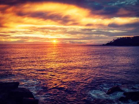 Ocean sunset with dramatic sky 스톡 사진