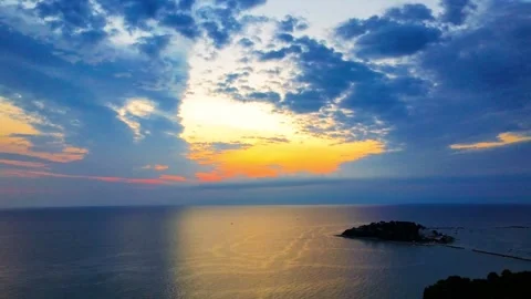 Ocean sunset with island Stock Footage 313504046