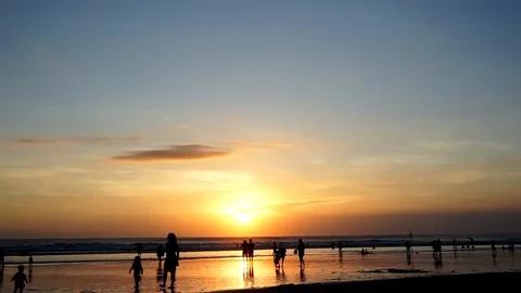 Ocean sunset with moving people Stock-Footage 110733415