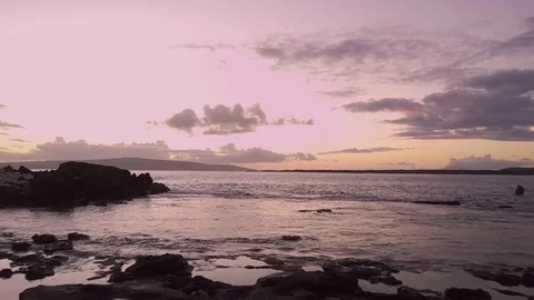 Ocean Sunset Over Lava Rocks And Crashing Waves 스톡 동영상 83733774