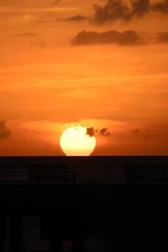 Ocean at sunset Stock Photos