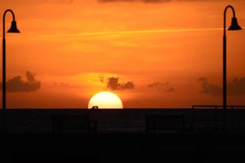 Ocean at sunset Stock Photos