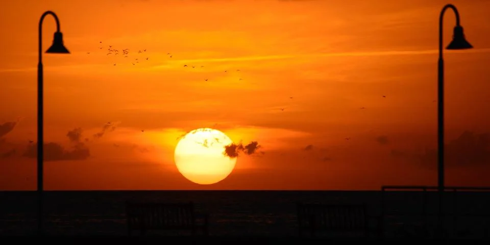 Ocean at sunset Stock Photos