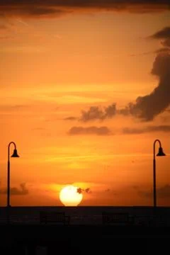 Ocean at sunset Stock Photos