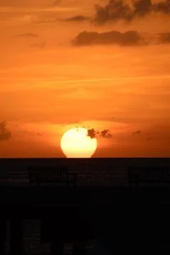 Ocean at sunset Stock Photos