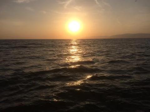 Ocean sunset Stock Photos