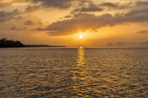 Ocean with sunset Stock Photos
