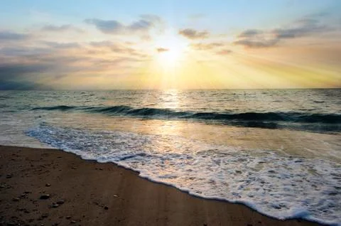 Ocean Sunset Rays Stock Photos