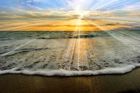 Ocean Sunset Rays Stock Photos