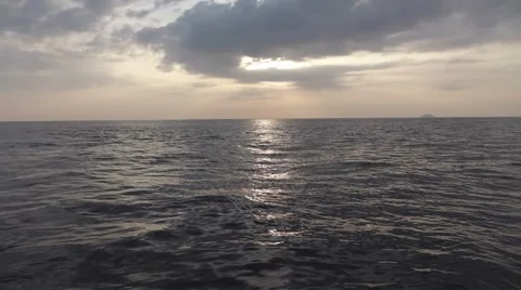 Ocean at sunset slow motion  Stock Footage 66250378
