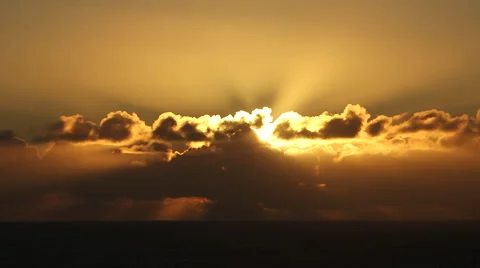 OCEAN SUNSET TIMELAPSE WITH LIGHT RAYS AND ORANGE LIGHT Stock Footage 59071247