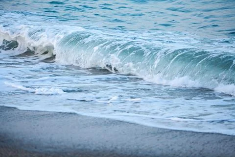 Ocean Sunset Wave, clear water in Tropical sea colorful background Stock Photos