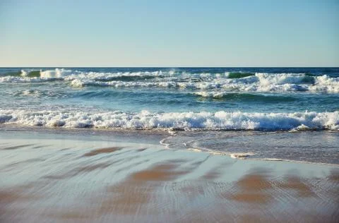 Ocean at sunset with waves 写真素材