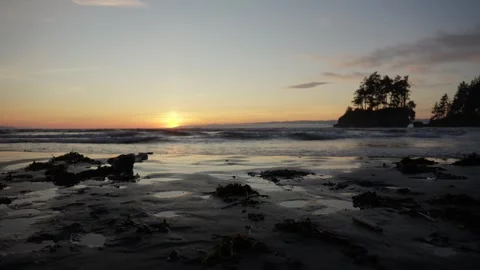Ocean Sunset Waves Reflecting on Wet Sand beach 動画素材 314030659