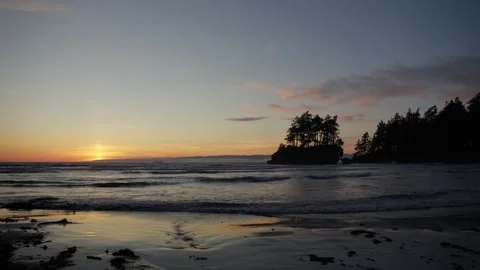Ocean Sunset Waves Reflecting on Wet Sand beach Stock Footage 314082081