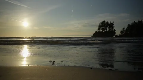 Ocean Sunset Waves Reflecting on Wet Sand beach Stock Footage 316369630