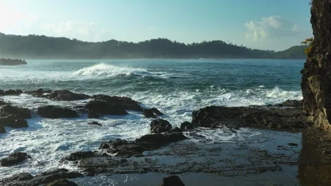Ocean Surf Along Coastal Cliffs Aerial Footage Stock Footage 339630543