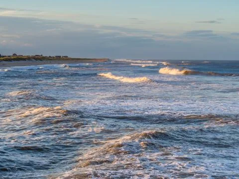 Ocean surf at sandy beach Stock-Fotos