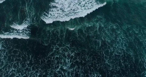 Ocean Surf Waves Crashing on Beach from Aerial Perspective Stock Footage 332145405